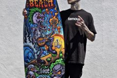 Travis-Barker-with-Drew-Brophy-Surfboard-2019-Back-to-the-Beach-Huntington-Beach-Festival