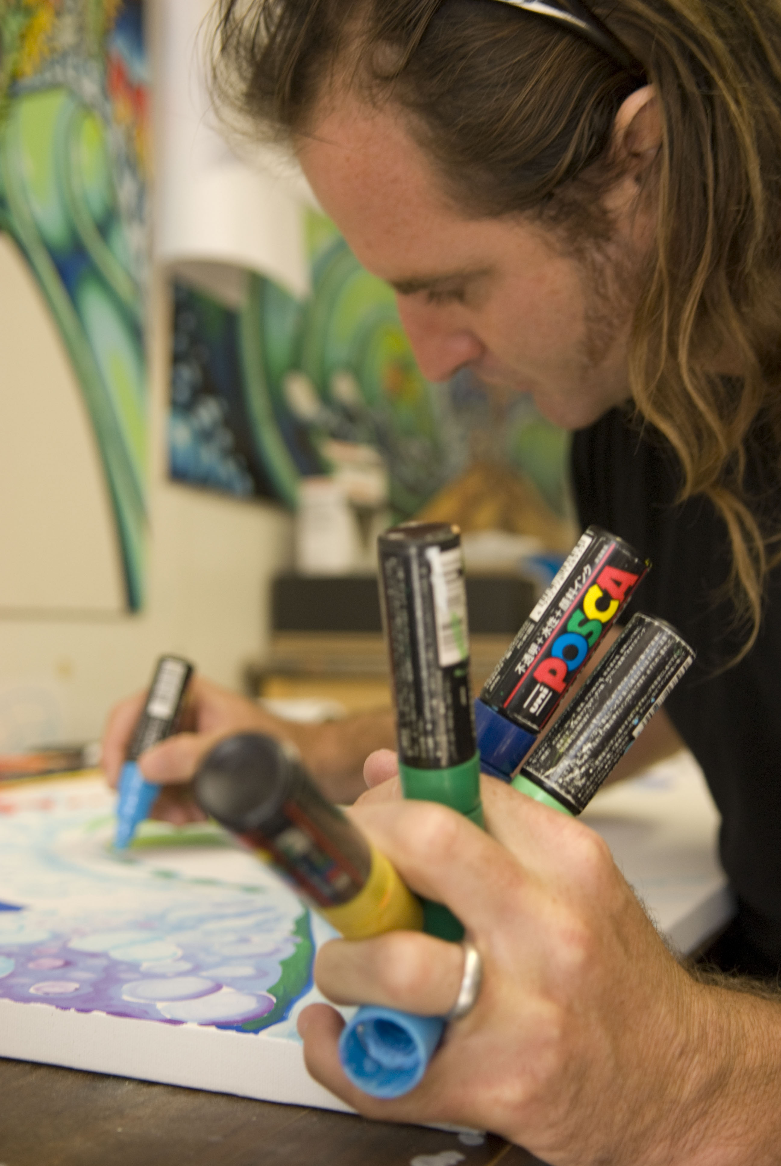 Drew Brophy and his Paint Pens. Photo by Aaron Bickford